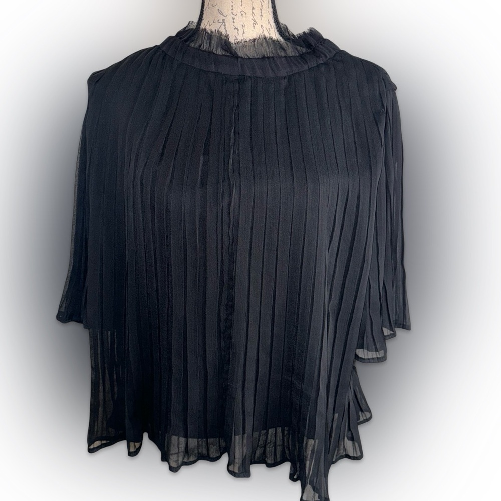 Seen Worn Kept Top